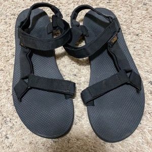 Black Teva sandals.